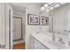 Clean bathroom featuring a sink, large vanity mirror, and framed art at 3733 Chattahoochee Summit Se Dr # 7, Atlanta, GA 30339