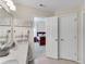 Bright bathroom featuring a sink, a well-lit mirror, and an open doorway to the bedroom at 3733 Chattahoochee Summit Se Dr # 7, Atlanta, GA 30339