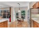 Bright dining area with backyard views, Stainless refrigerator, and a door to the patio at 3733 Chattahoochee Summit Se Dr # 7, Atlanta, GA 30339