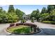Beautiful lush landscaping leads to the gated entrance of the community at 3733 Chattahoochee Summit Se Dr # 7, Atlanta, GA 30339
