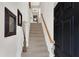 Inviting entryway with staircase, decorative mirror, and elegant accents, welcoming guests into the home at 3733 Chattahoochee Summit Se Dr # 7, Atlanta, GA 30339