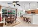 Open kitchen and dining area with stainless steel appliances and outdoor access at 3733 Chattahoochee Summit Se Dr # 7, Atlanta, GA 30339