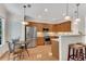 Modern kitchen with stainless appliances, wood cabinets, and an eat-in area at 3733 Chattahoochee Summit Se Dr # 7, Atlanta, GA 30339