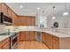 Updated kitchen with stainless appliances, bright countertops, and hardwood floors at 3733 Chattahoochee Summit Se Dr # 7, Atlanta, GA 30339