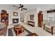 Cozy living room with a fireplace, ceiling fan, and comfortable furnishings at 3733 Chattahoochee Summit Se Dr # 7, Atlanta, GA 30339