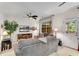 Comfortable living room with lots of natural light, a large sofa, and a view of the backyard at 3733 Chattahoochee Summit Se Dr # 7, Atlanta, GA 30339