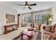 Elegant living room featuring cozy furniture, neutral tones, large windows, and stylish decor at 3733 Chattahoochee Summit Se Dr # 7, Atlanta, GA 30339