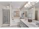 Bright main bathroom with dual vanities, separate shower, and luxurious soaking tub at 3733 Chattahoochee Summit Se Dr # 7, Atlanta, GA 30339