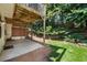 Outdoor patio space with under-decking coverage and lush landscaping at 3733 Chattahoochee Summit Se Dr # 7, Atlanta, GA 30339