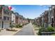 Scenic street view highlighting a row of brick townhomes with manicured front yards and community charm at 3733 Chattahoochee Summit Se Dr # 7, Atlanta, GA 30339