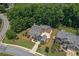An aerial view of a home showcasing the surrounding landscape and neighborhood at 501 Highwater Pass, Canton, GA 30114