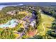 Aerial view of community with a pool, parking, playground, and golf course at 501 Highwater Pass, Canton, GA 30114