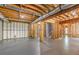Unfinished basement featuring exposed wood studs and ductwork, a concrete floor and plenty of potential at 501 Highwater Pass, Canton, GA 30114