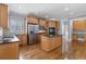 Open kitchen with stainless steel appliances and granite countertops at 501 Highwater Pass, Canton, GA 30114