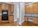 Kitchen with stainless steel oven and desk area at 501 Highwater Pass, Canton, GA 30114