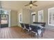 Covered porch area with outdoor seating, perfect for relaxing or entertaining guests at 501 Highwater Pass, Canton, GA 30114