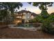 Inviting backyard pool and spa area with lush landscaping, offering a perfect space for relaxation at 510 Northland Ridge Ct, Sandy Springs, GA 30342