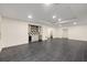 Finished basement features recessed lighting, tiled floors, and a convenient wet bar area at 510 Northland Ridge Ct, Sandy Springs, GA 30342