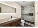 Modern bathroom with a sleek vanity, lighted mirror, and a glass-enclosed shower at 510 Northland Ridge Ct, Sandy Springs, GA 30342