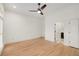Spacious bedroom with hardwood floors, access to an ensuite bathroom and closet at 510 Northland Ridge Ct, Sandy Springs, GA 30342