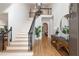 Grand foyer with a staircase, hardwood floors, and stylish decor at 510 Northland Ridge Ct, Sandy Springs, GA 30342