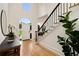 Welcoming foyer featuring high ceilings, hardwood floors, and a staircase at 510 Northland Ridge Ct, Sandy Springs, GA 30342