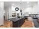 Bright kitchen with a dark island, stainless steel appliances and white cabinetry at 510 Northland Ridge Ct, Sandy Springs, GA 30342