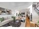 Bright living room flowing into dining area with stylish decor and hardwood flooring at 510 Northland Ridge Ct, Sandy Springs, GA 30342