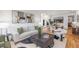Bright living room flowing into dining area with stylish decor and hardwood flooring at 510 Northland Ridge Ct, Sandy Springs, GA 30342