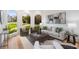 Cozy living room with large arched windows, stylish furniture, and hardwood floors at 510 Northland Ridge Ct, Sandy Springs, GA 30342