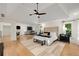 Open concept main bedroom with hardwood floors, seating area, and ensuite bathroom access at 510 Northland Ridge Ct, Sandy Springs, GA 30342