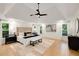 Luxurious main bedroom with tray ceiling, large windows, and hardwood floors at 510 Northland Ridge Ct, Sandy Springs, GA 30342