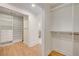 Spacious walk-in closet with custom shelving and drawers for optimal storage, adjacent to the bathroom at 510 Northland Ridge Ct, Sandy Springs, GA 30342