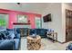 Cozy living room with fireplace, TV, comfortable seating and lots of light at 578 Mcgill Ne Pl # 578, Atlanta, GA 30312