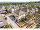 Aerial view of a well manicured home featuring a white picket fence, beautiful landscaping, and private driveway at 1370 Dupont Nw Park, Atlanta, GA 30318