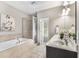 Relaxing bathroom features double sinks, separate shower, and soaking tub at 1370 Dupont Nw Park, Atlanta, GA 30318
