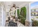 Inviting front porch with rocking chairs, ceiling fans and stone pillar accents at 1370 Dupont Nw Park, Atlanta, GA 30318