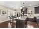 Modern kitchen with island, stainless steel appliances, and hardwood floors at 1370 Dupont Nw Park, Atlanta, GA 30318