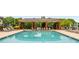 A covered pool area has lounge chairs surrounding the pool at 1370 Dupont Nw Park, Atlanta, GA 30318