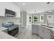 A kitchen with bright countertops, stainless steel appliances, and modern cabinetry at 3439 Twin Village Ct, Snellville, GA 30039