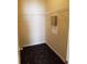 A walk-in closet with installed shelving and patterned carpet adds to the functionality and storage space at 5252 Inverness Ct, Douglasville, GA 30135