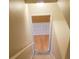 Carpeted stairway leads to another level of the house at 5252 Inverness Ct, Douglasville, GA 30135