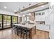 Modern kitchen with large island, stainless steel appliances, and stylish pendant lighting at 604 Trinity Church Rd, Canton, GA 30115