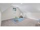 Playroom with plush carpeting, bright light, and a dedicated play area at 604 Trinity Church Rd, Canton, GA 30115