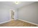 Bright, airy bedroom with hardwood flooring and an ensuite bathroom at 901 Abernathy Rd # 2200, Sandy Springs, GA 30328