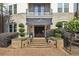 Charming building entrance with well-maintained landscaping and elegant signage at 901 Abernathy Rd # 2200, Sandy Springs, GA 30328