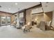 Lobby area featuring seating, fireplace, and elegant finishes at 901 Abernathy Rd # 2200, Sandy Springs, GA 30328