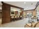 Lobby area featuring seating, bar, fireplace, and elegant finishes at 901 Abernathy Rd # 2200, Sandy Springs, GA 30328
