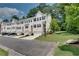 A row of townhouses with neat lawns, driveways, and garages, showcasing an inviting street view at 1823 Lynwood Ln, Atlanta, GA 30329
