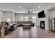 Spacious living room with hardwood floors, fireplace, and large windows at 1823 Lynwood Ln, Atlanta, GA 30329